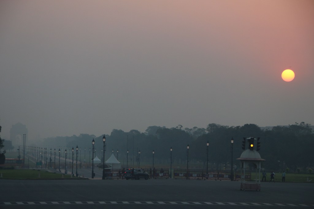 Day after Diwali festival morning visual with layer of pollution over India gate