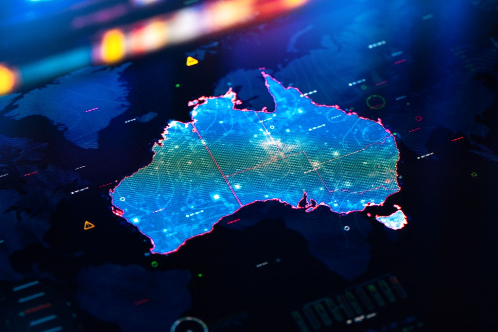 Australia map with bright lights on a dark surface