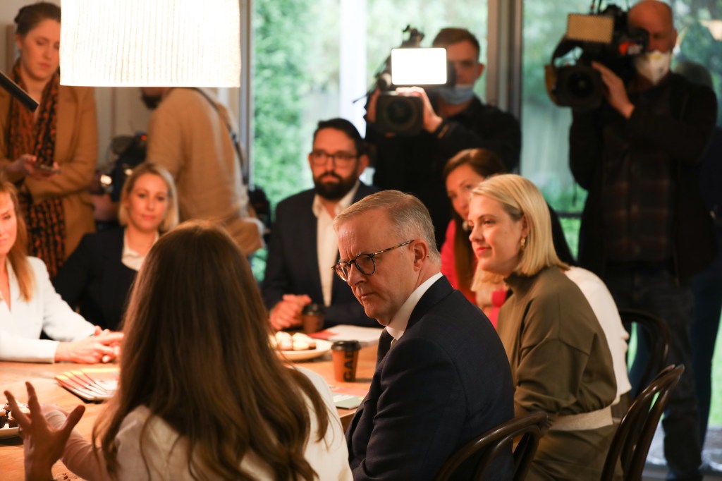 Georgie Dent, pictured to the right of Prime Minister Anthony Albanese, has been instrumental in negotiating a better deal for working parents.