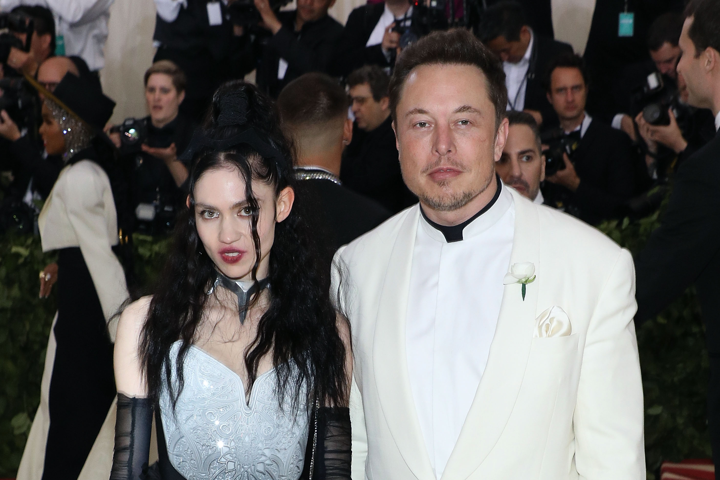 Grimes sues Elon Musk over parental rights of their three children, reports