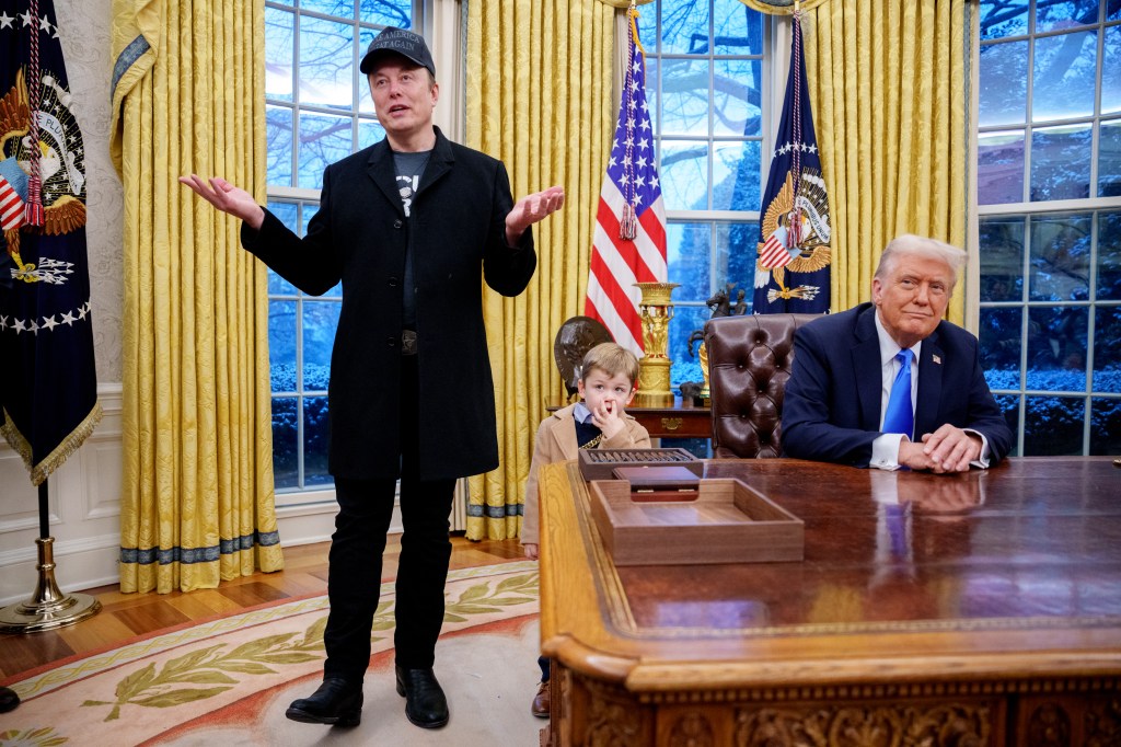 WASHINGTON, DC - FEBRUARY 11: Tesla and SpaceX CEO Elon Musk, accompanied by U.S. President Donald Trump (R), and his son X Musk, speaks during an executive order signing in the Oval Office at the White House on February 11, 2025 in Washington, DC. Trump is to sign an executive order implementing the Department of Government Efficiency's (DOGE) "workforce optimization initiative," which, according to Trump, will encourage agencies to limit hiring and reduce the size of the federal government. (Photo by Andrew Harnik/Getty Images)